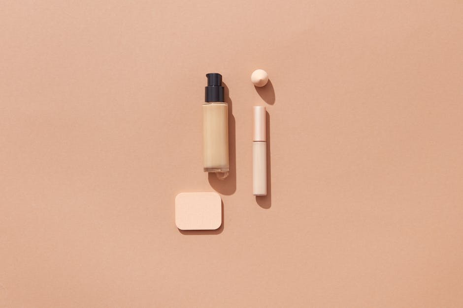Flat lay of beauty products on a brown background with space for text, ideal for cosmetic promotions.