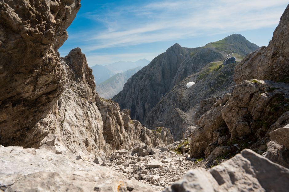 Discover the rugged beauty of a rocky alpine mountain landscape bathed in sunlight.